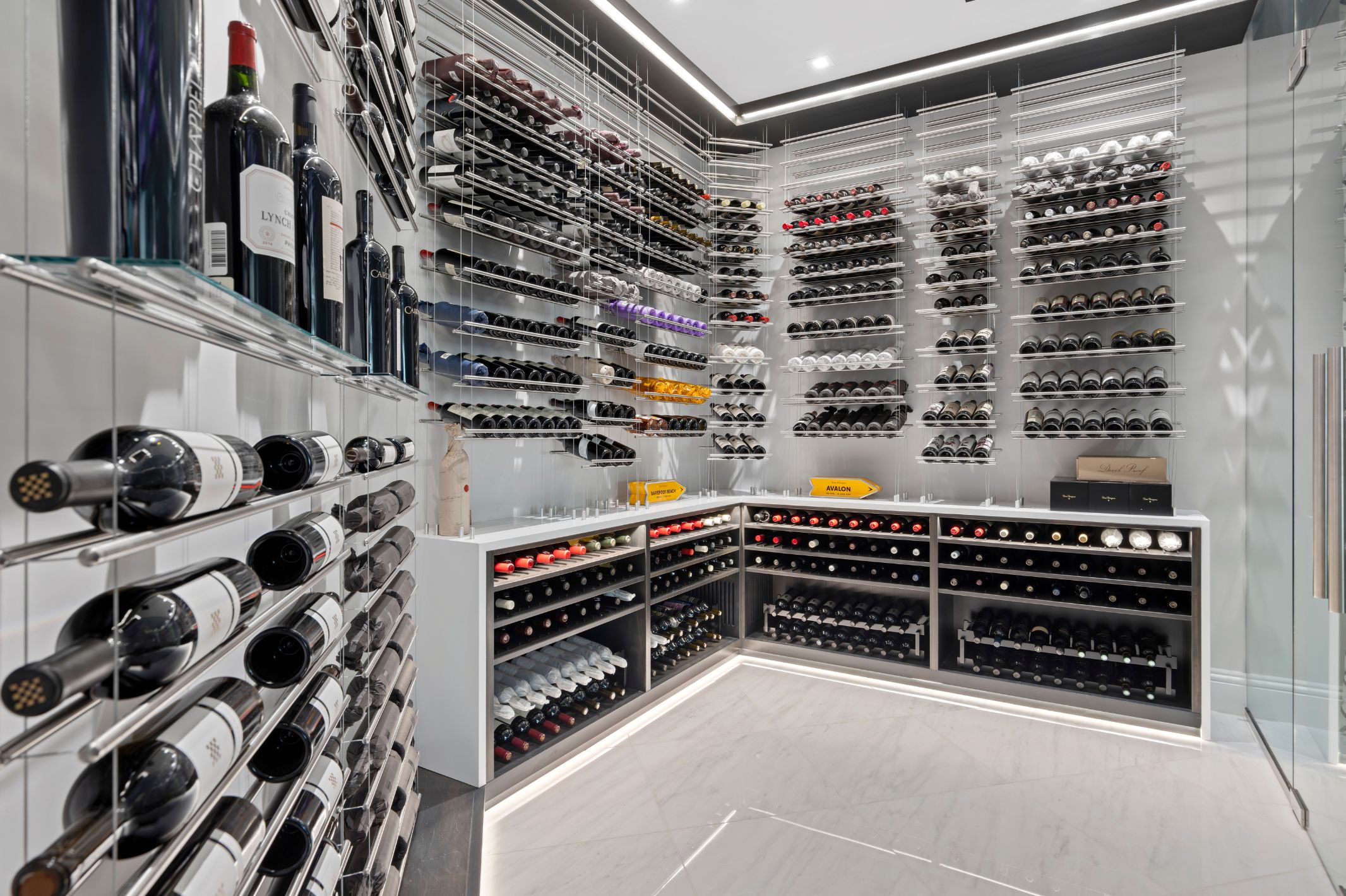 floating cables wine cellar design - wine cellar in living room