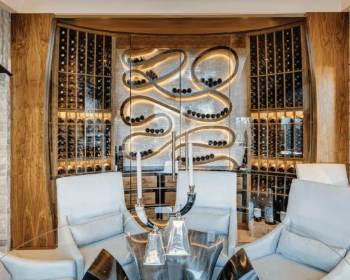 Wine cellar design with accent lighting from Genuwine Cellars